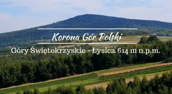 Łysica, najwyższy szczyt Gór Świętokrzyskich, wznosi się nad zielonymi wzgórzami.